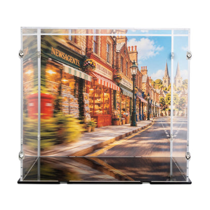 Acrylic vitrine with a printed street scene of a quaint town shopfront and road