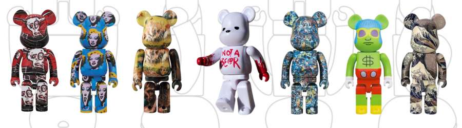 bearbrick figures with different art work on them